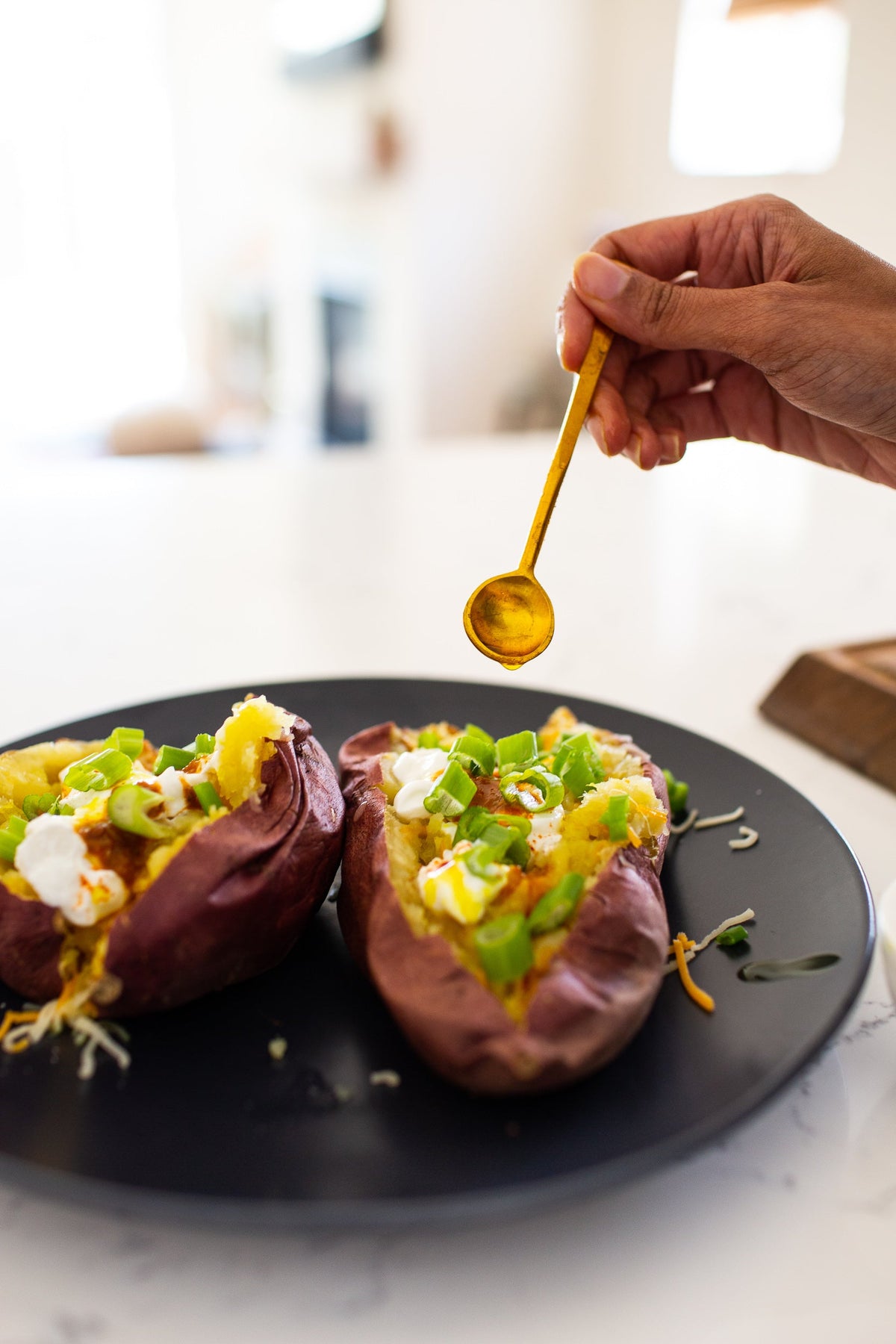 Aishwarya's Perfect Messy Baked Potatoes with a Turmeric Oil Drizzle